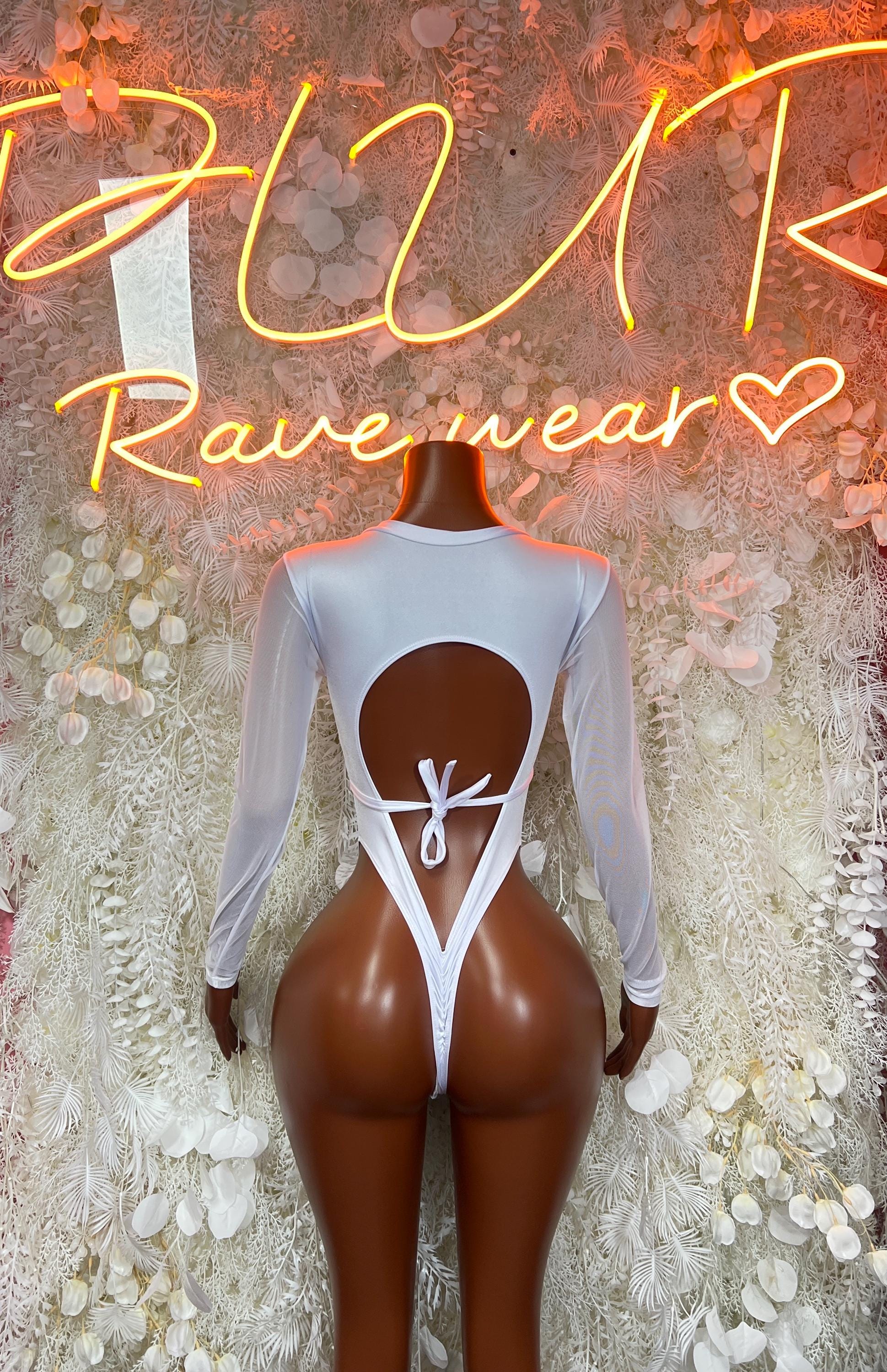 White long-sleeve bodysuit with open back and crisscross strap cutouts