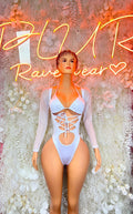 White bodysuit with long sleeves and crisscross lace-up front cutout