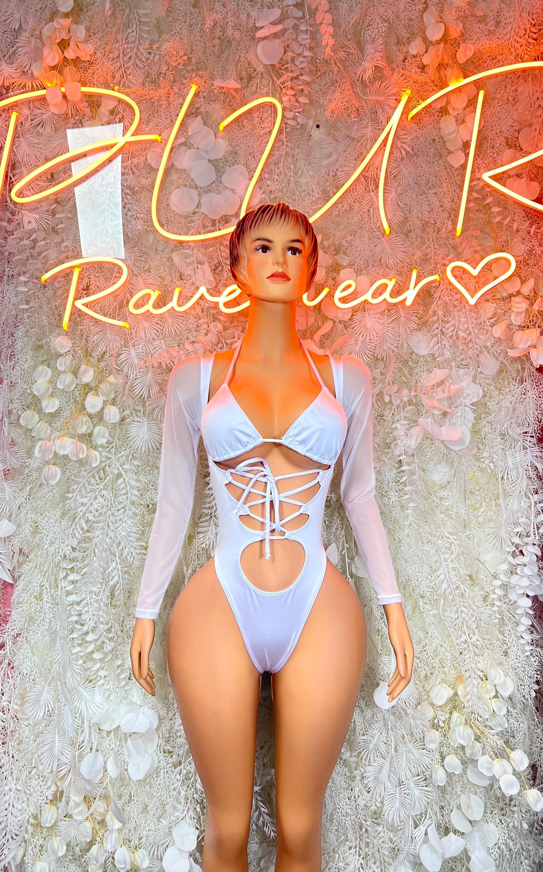 White bodysuit with long sleeves and crisscross lace-up front cutout