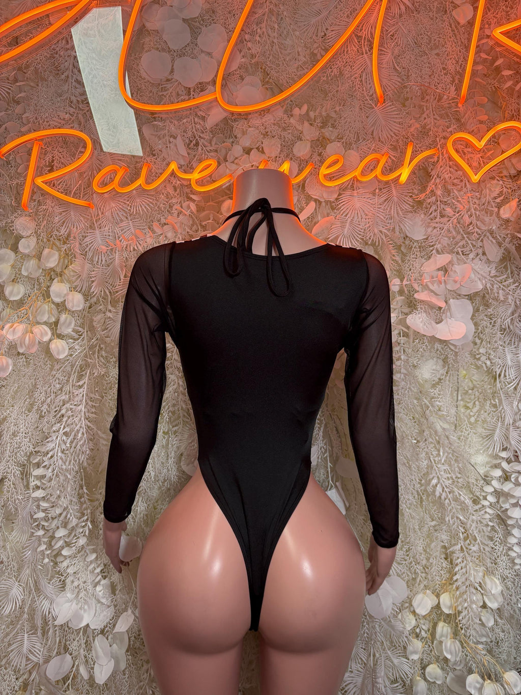 Black long-sleeve sheer bodysuit with back keyhole and neck tie