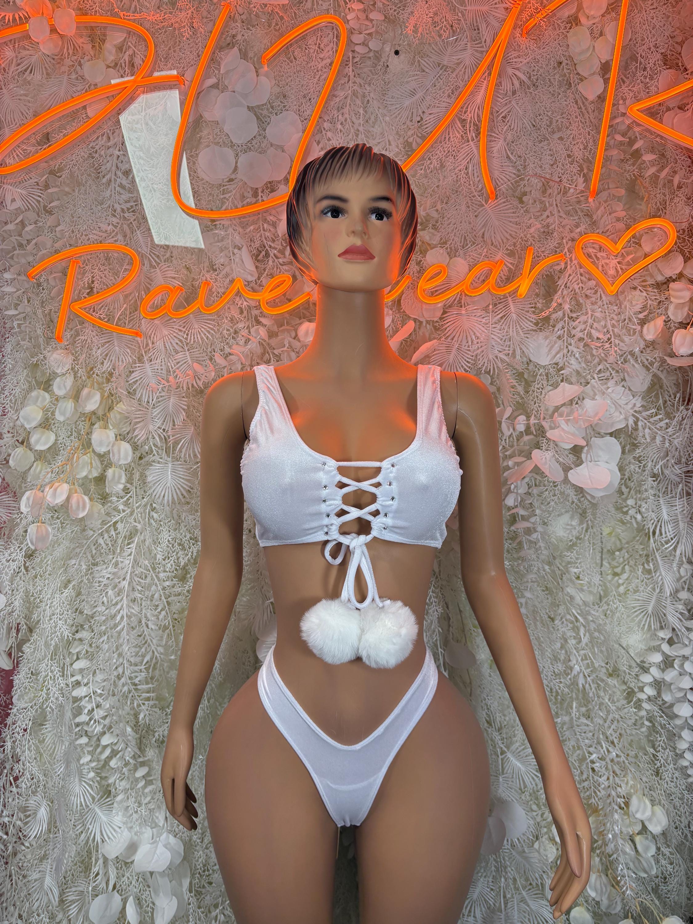 White two-piece skirt set: lace-up white crop top and high-cut bikini bottoms