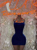 Blue velvet mini dress with halter neckline, fitted bodycon silhouette