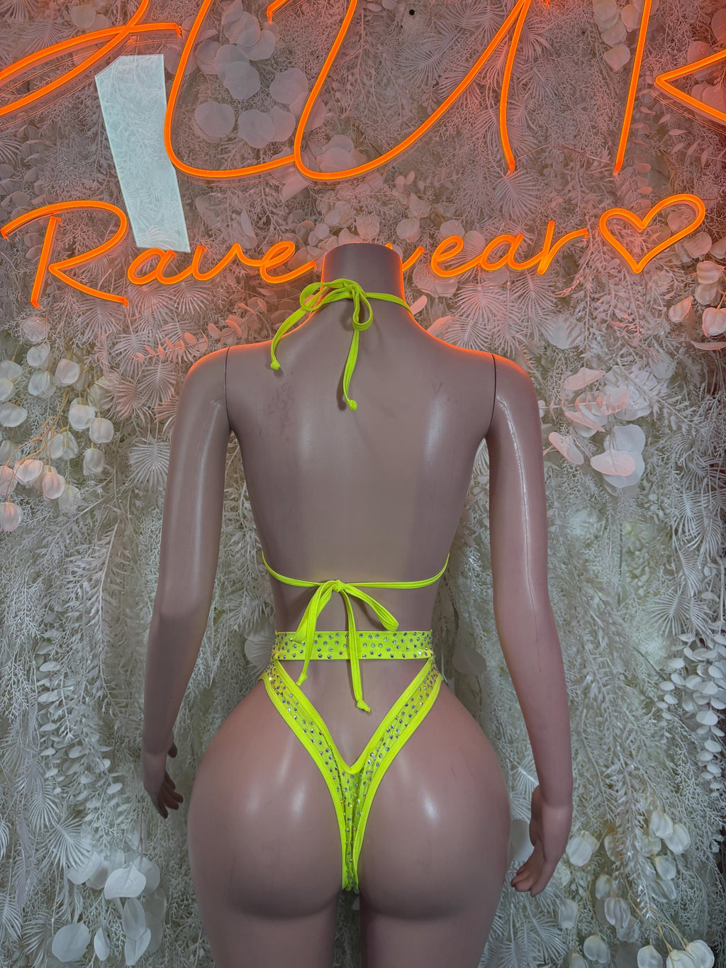 Neon green rhinestone back-tie bralette and thong two-piece rave set