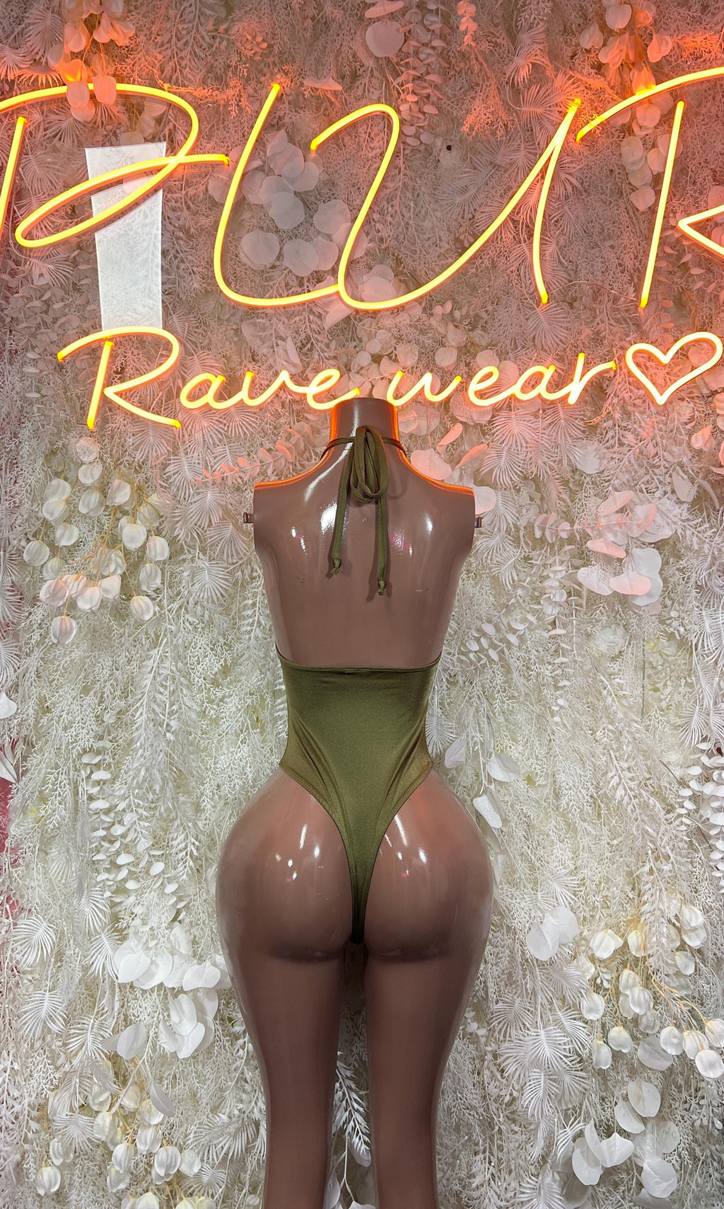 Forest green one-piece dancewear with low back and halter-style straps