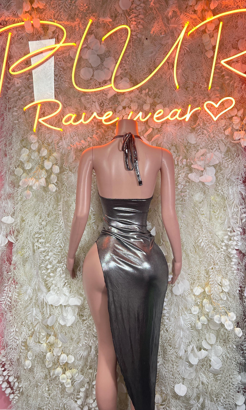Backless silver metallic gown with lace-trim V-neck and high side slit
