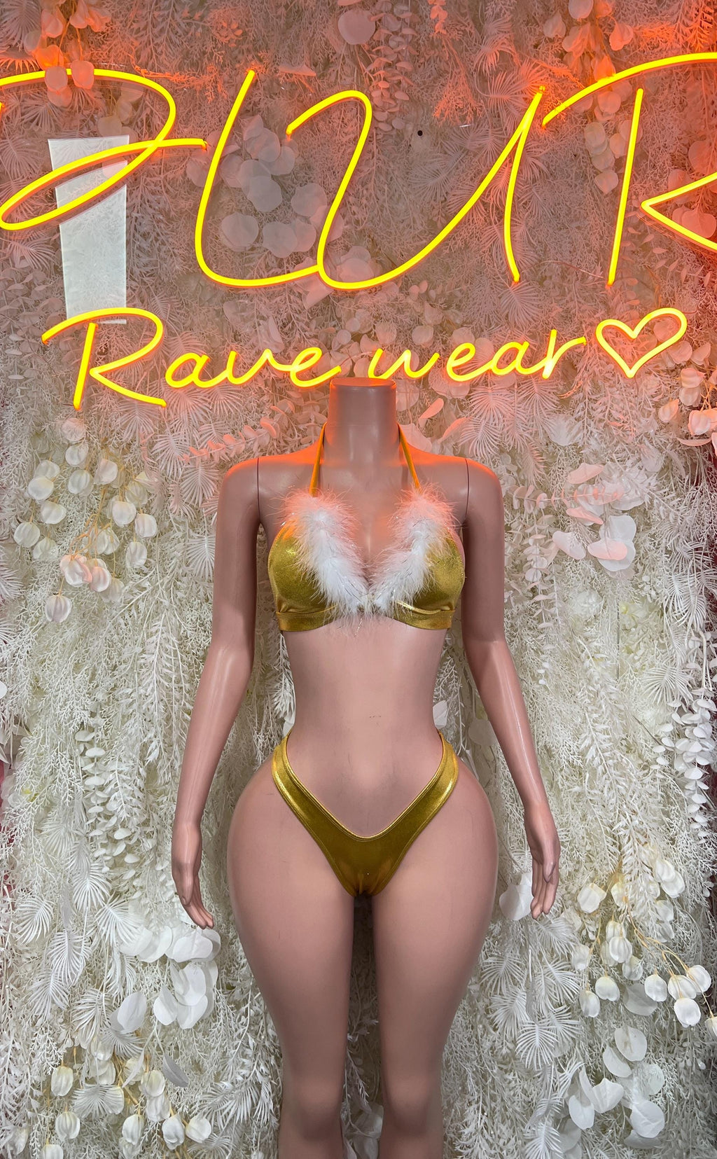 Gold metallic two-piece dance outfit with feather-trim bra and thong bottom