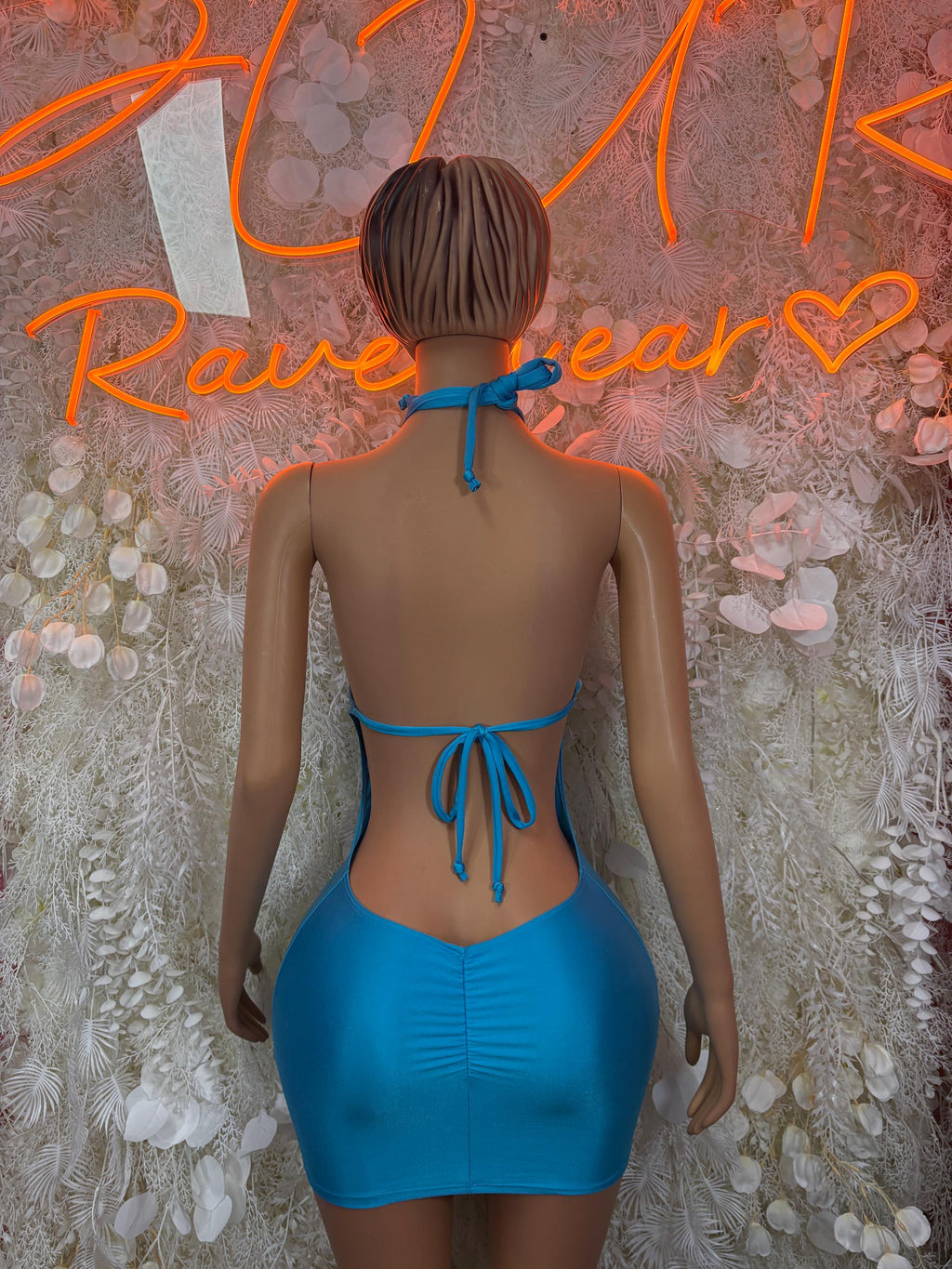 Turquoise halter mini dress with open back and tied halter straps
