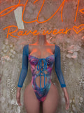 Blue long-sleeve one-piece bodysuit with multicolor tropical print and front lace-up