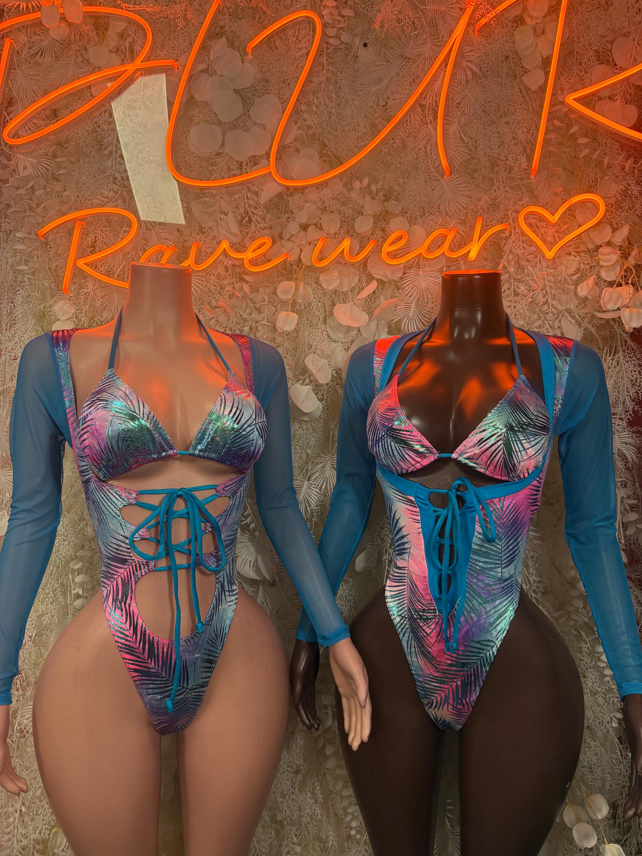 Tropical print one-piece bodysuit with long sleeves and front lace-up neckline