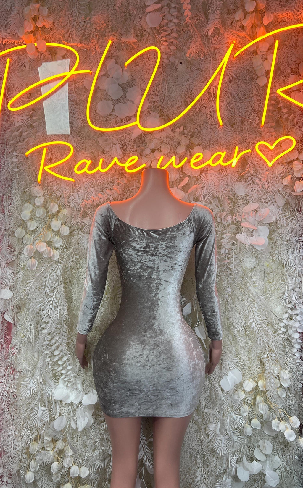 Silver velvet mini dress with long sleeves and plunging V neckline
