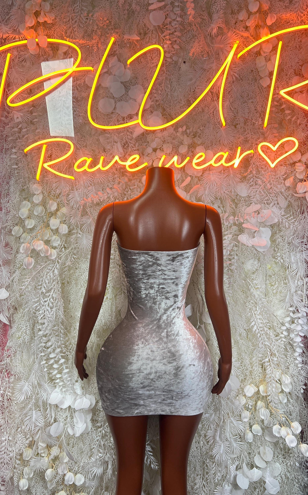 Silver velvet mini dress, back view with halter-style cutout and long sleeves