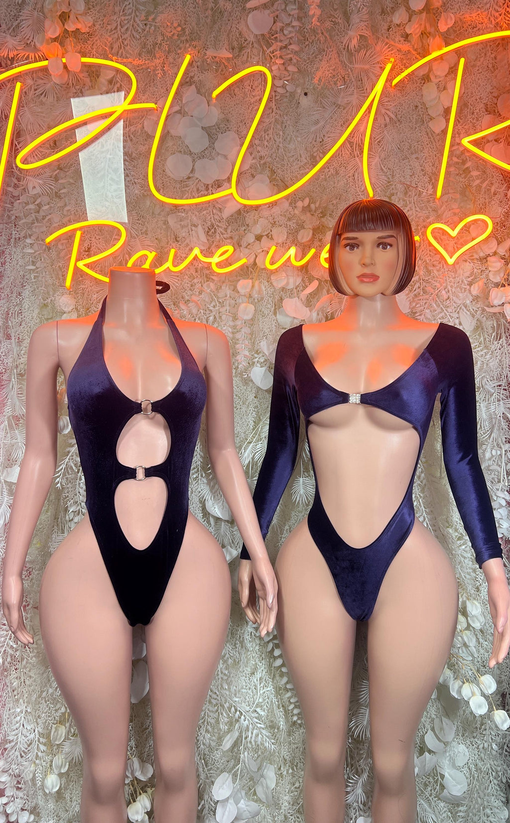 Purple velvet halter bodysuit with long sleeves, oval chest ring and cutout