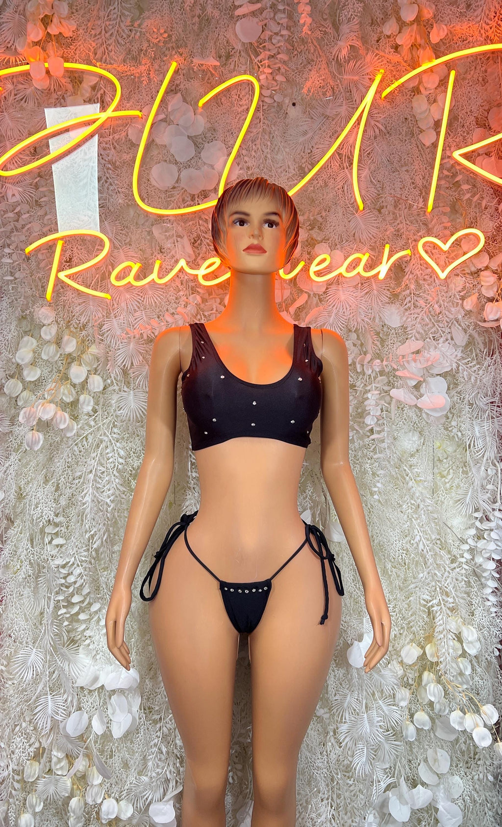 Black two-piece crop top and bikini bottoms, tie-side strings, sparkly studs