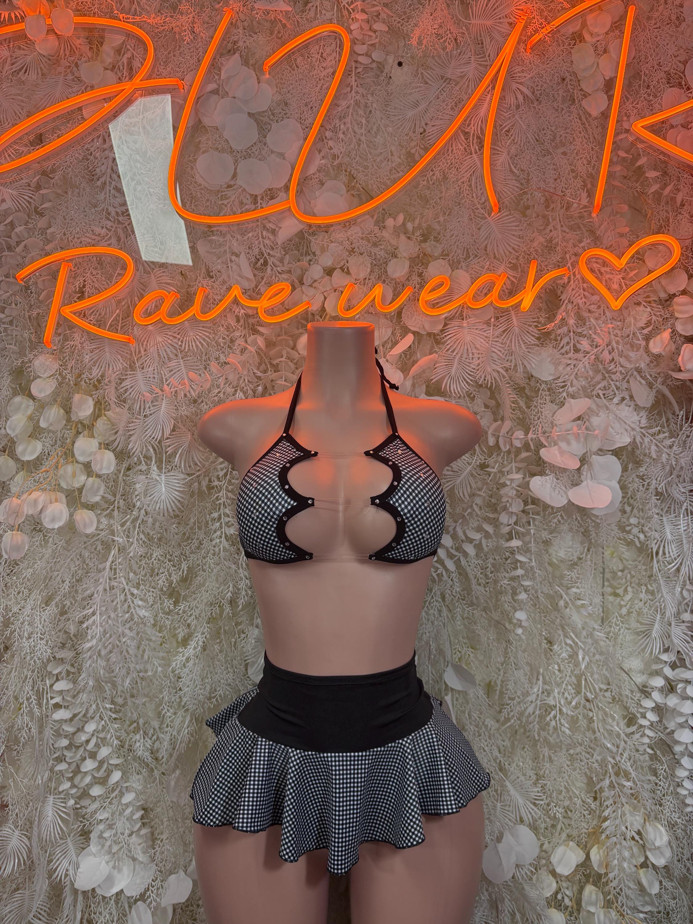 Rave outfit two-piece skirt set: pink-and-black check bikini top and black mini skirt