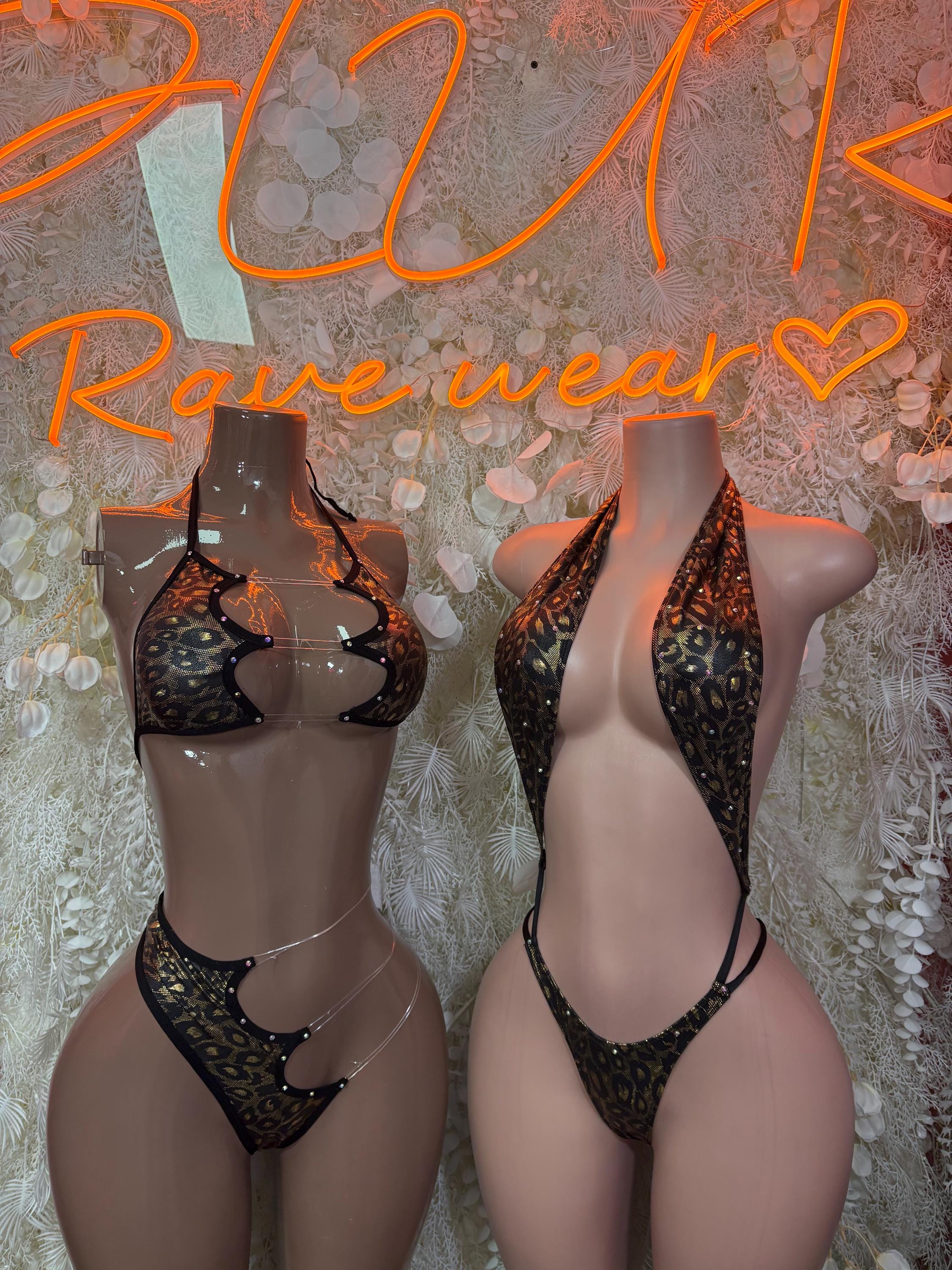 Cheetah print two-piece dancewear on mannequins, strappy bra and matching bottoms