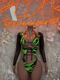 Black rave dancewear bodysuit with neon green graphic lines, long sleeves, cutout front