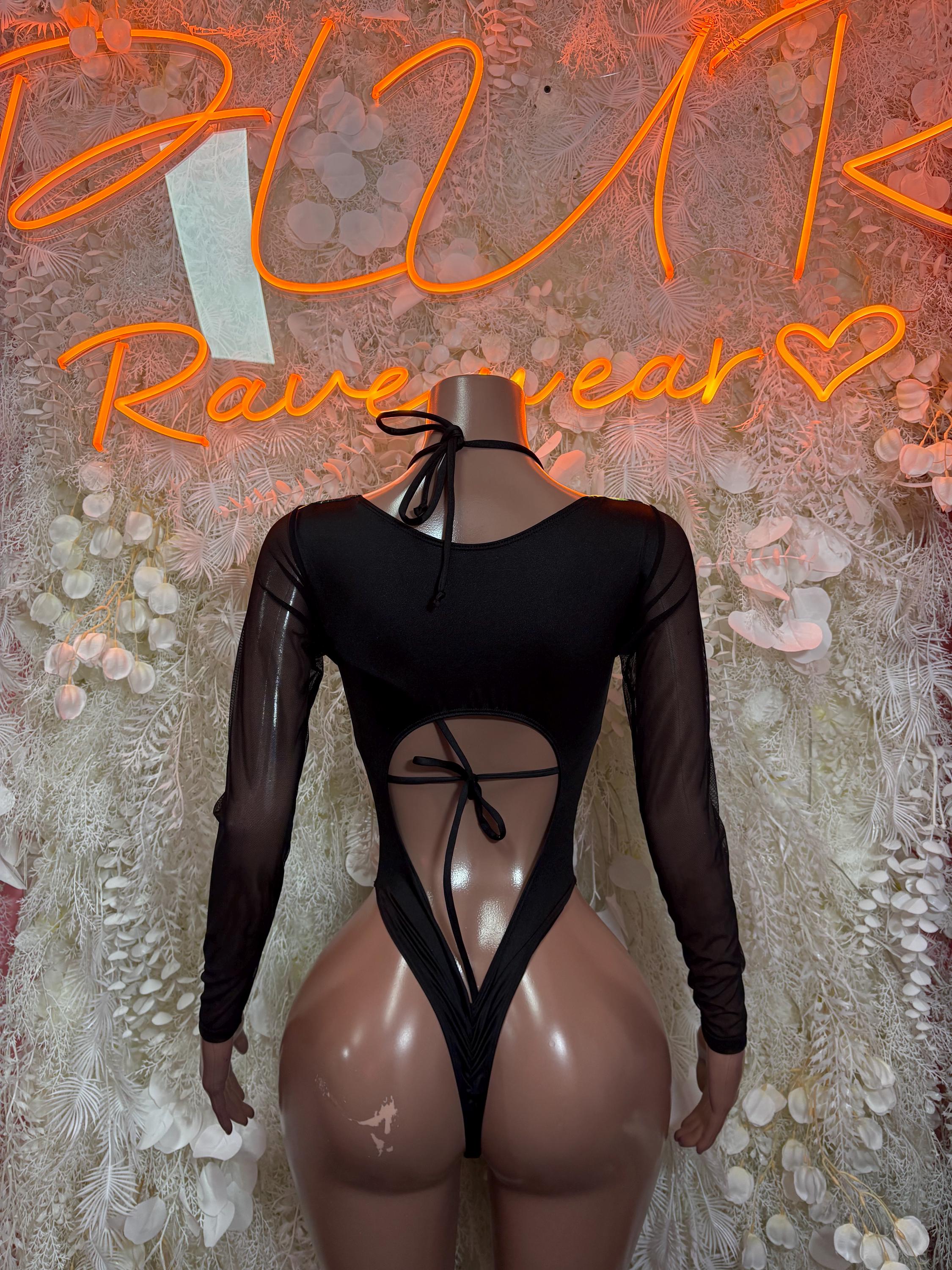 Black bodysuit back view with neon green cutout harness and long sheer sleeves