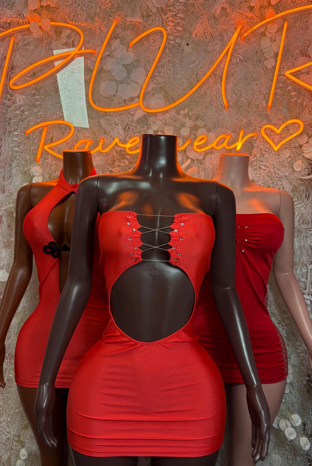 Red mini dress with corset bodice and decorative button detailing