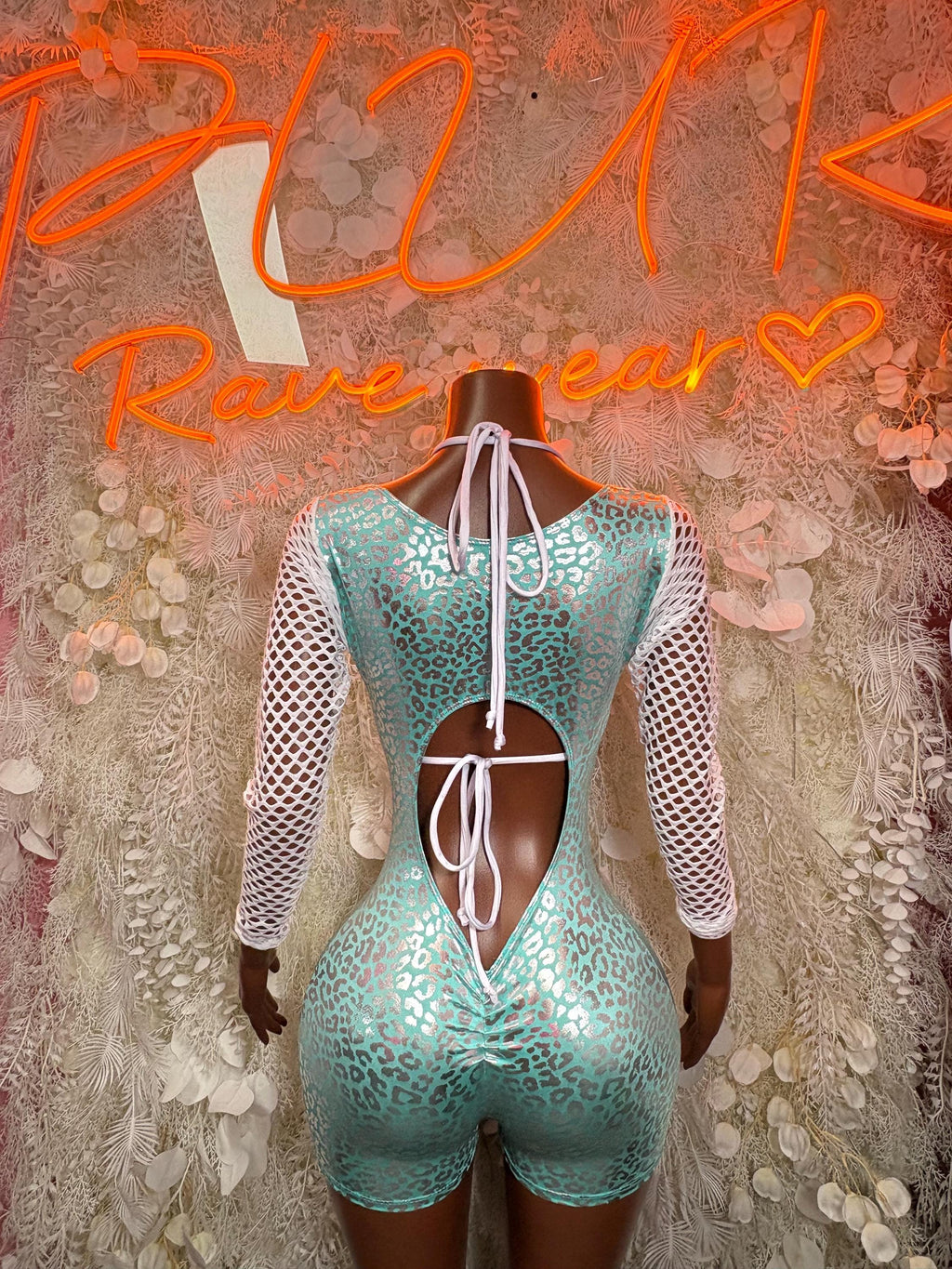 Turquoise cheetah-print bodysuit with long mesh sleeves, underbust tie and cutouts