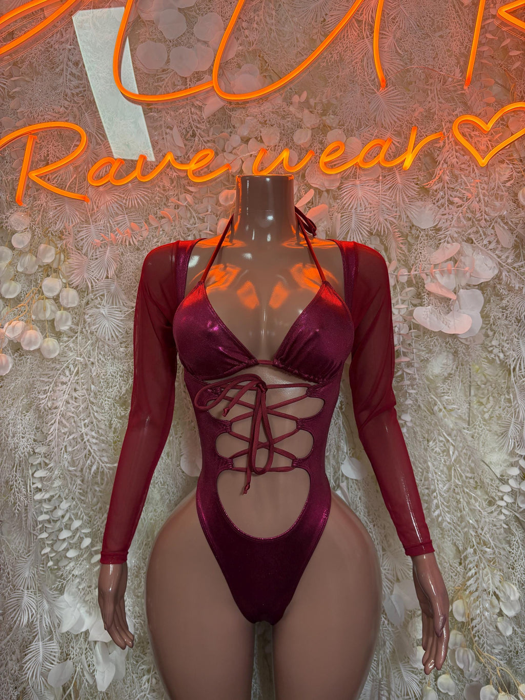 Burgundy lace-up one-piece bodysuit with long sheer sleeves and deep V neckline
