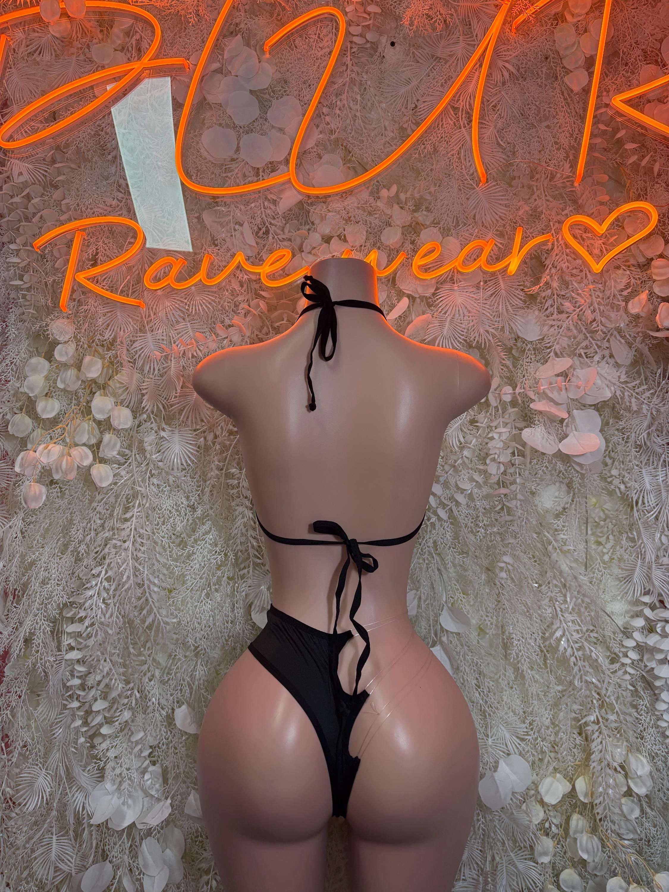 Sports referee lingerie set, back view: tie-string black thong and black/white striped bra