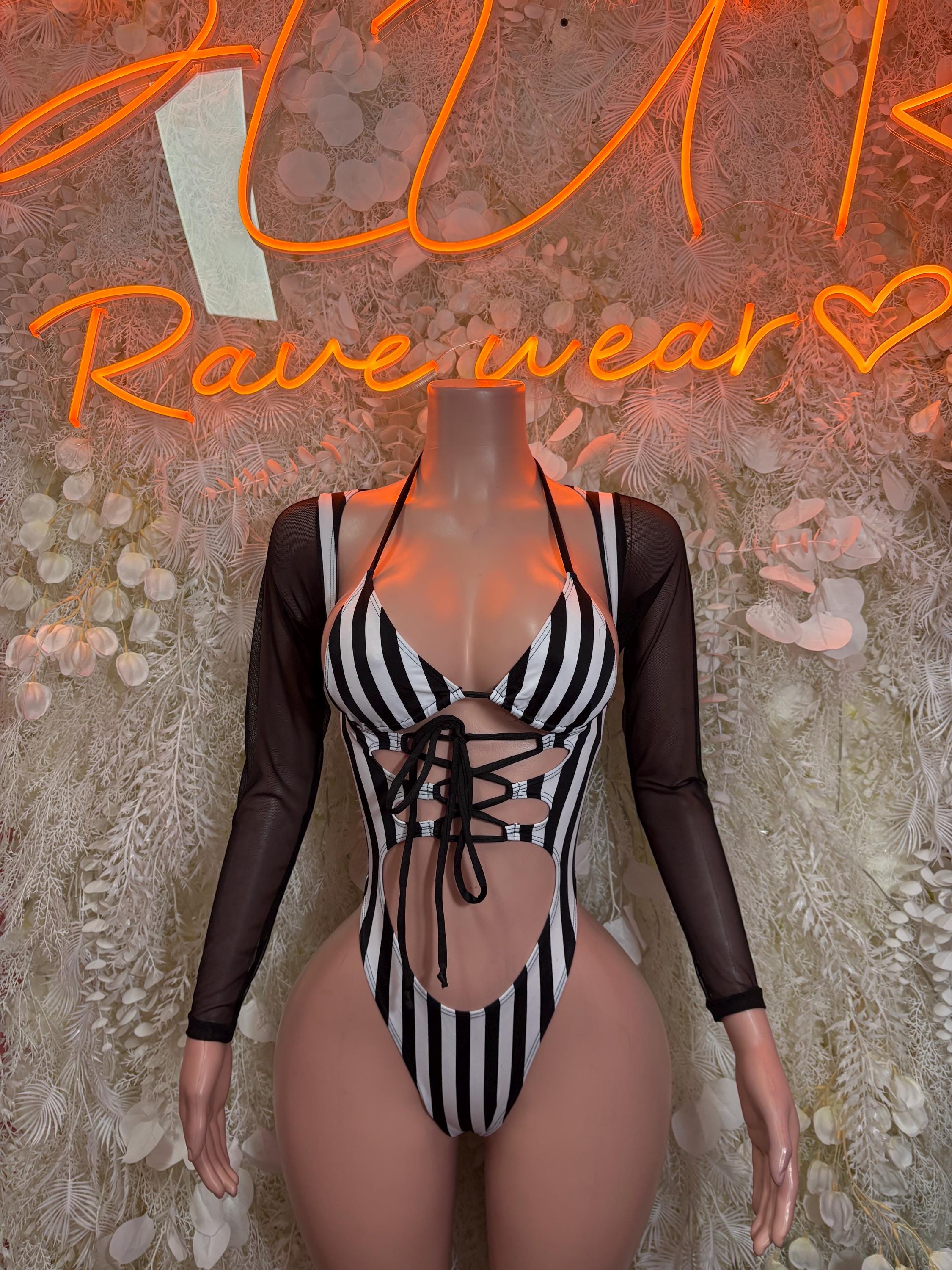 Black and white striped referee bodysuit with lace-up front and sheer long sleeves