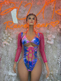 Metallic bodysuit with blue and pink pattern, front lace-up and long pink sleeves