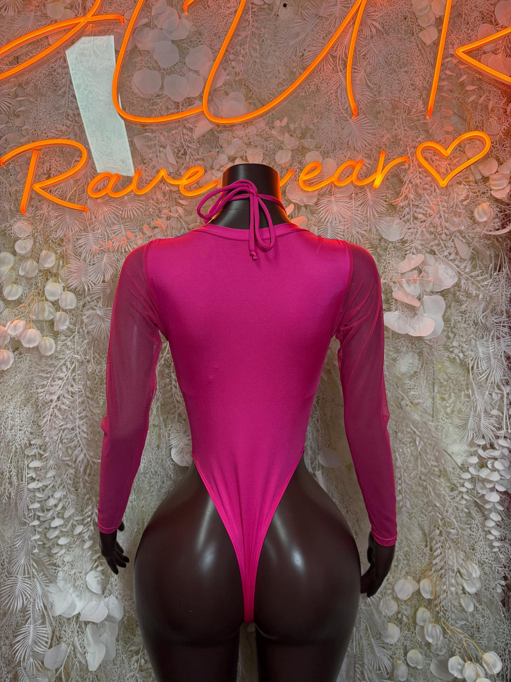 Magenta long-sleeve bodysuit with high neck tie, back view thong cut