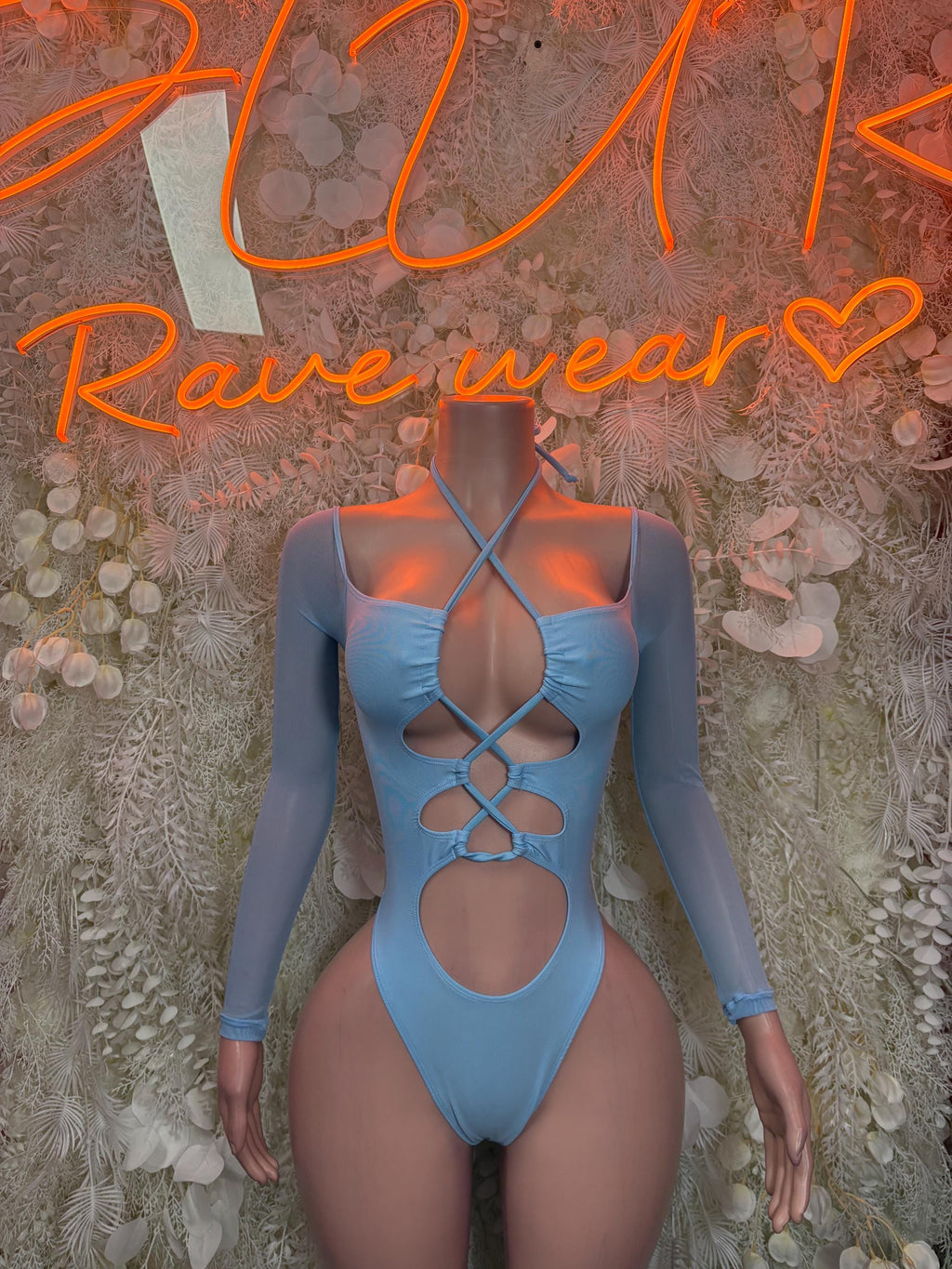 Light blue long-sleeve lace-up cutout bodysuit with open center and V neckline