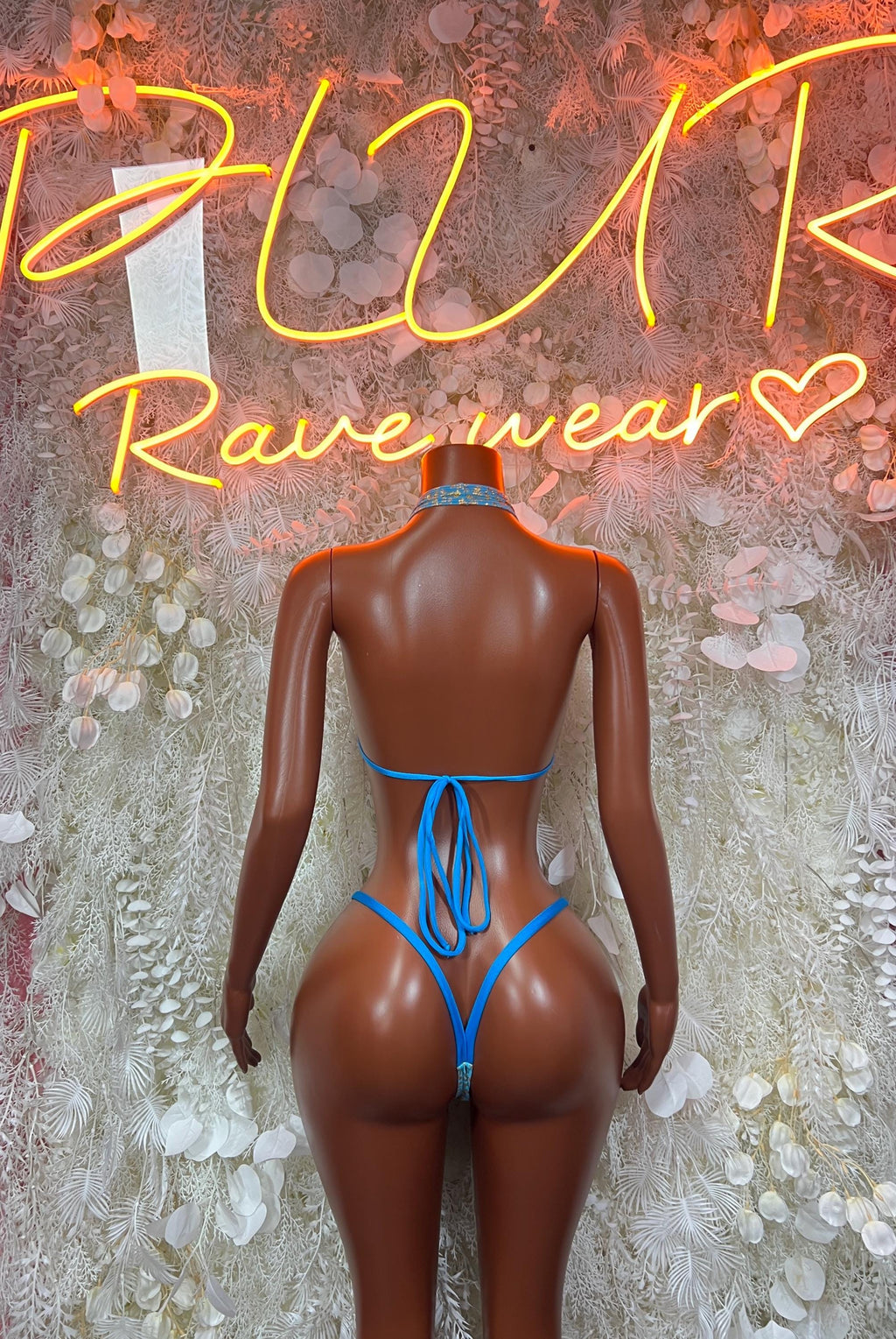 Turquoise two-piece bikini set with lace-up back and matching thong bottoms