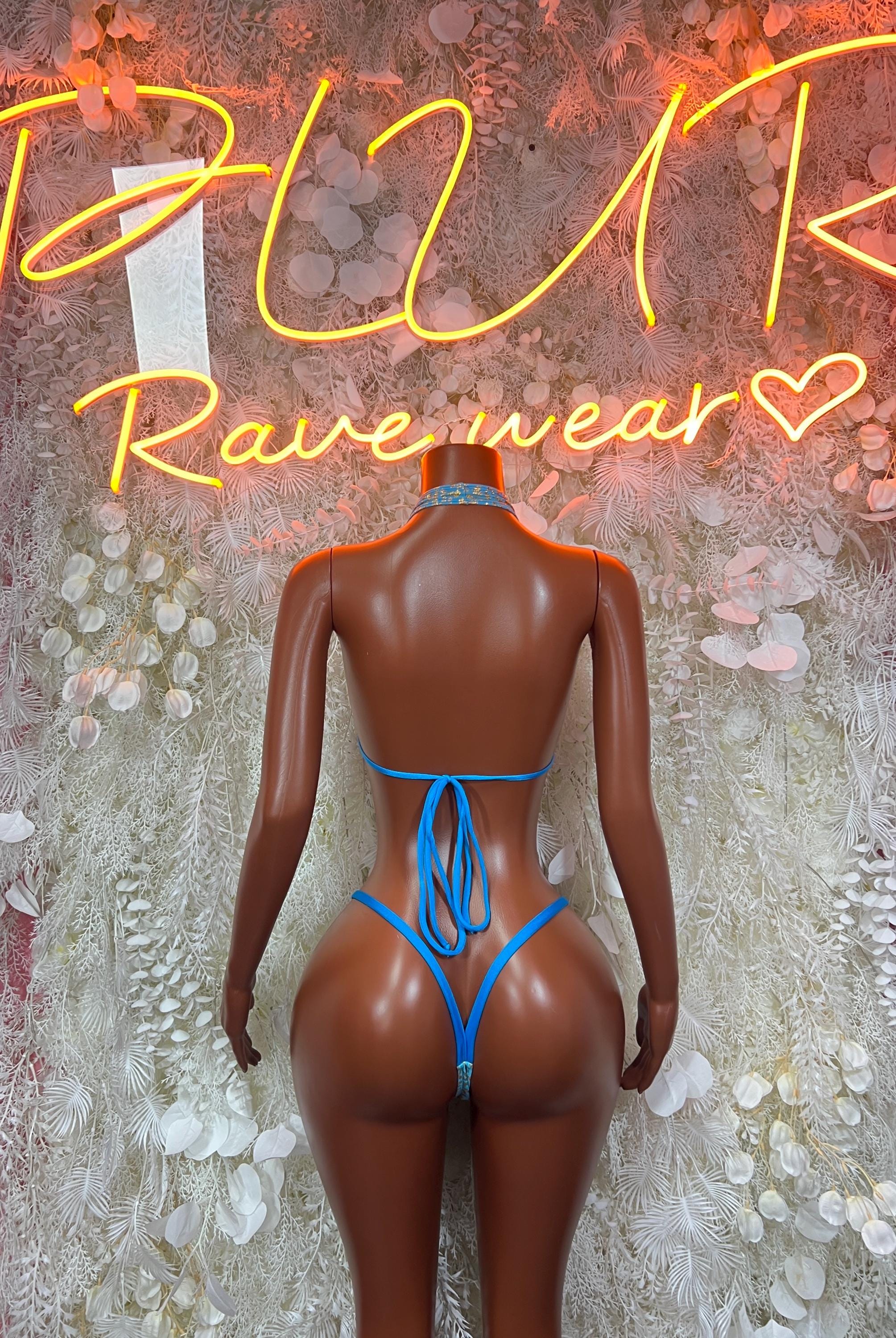 Turquoise two-piece bikini set with lace-up back and matching thong bottoms