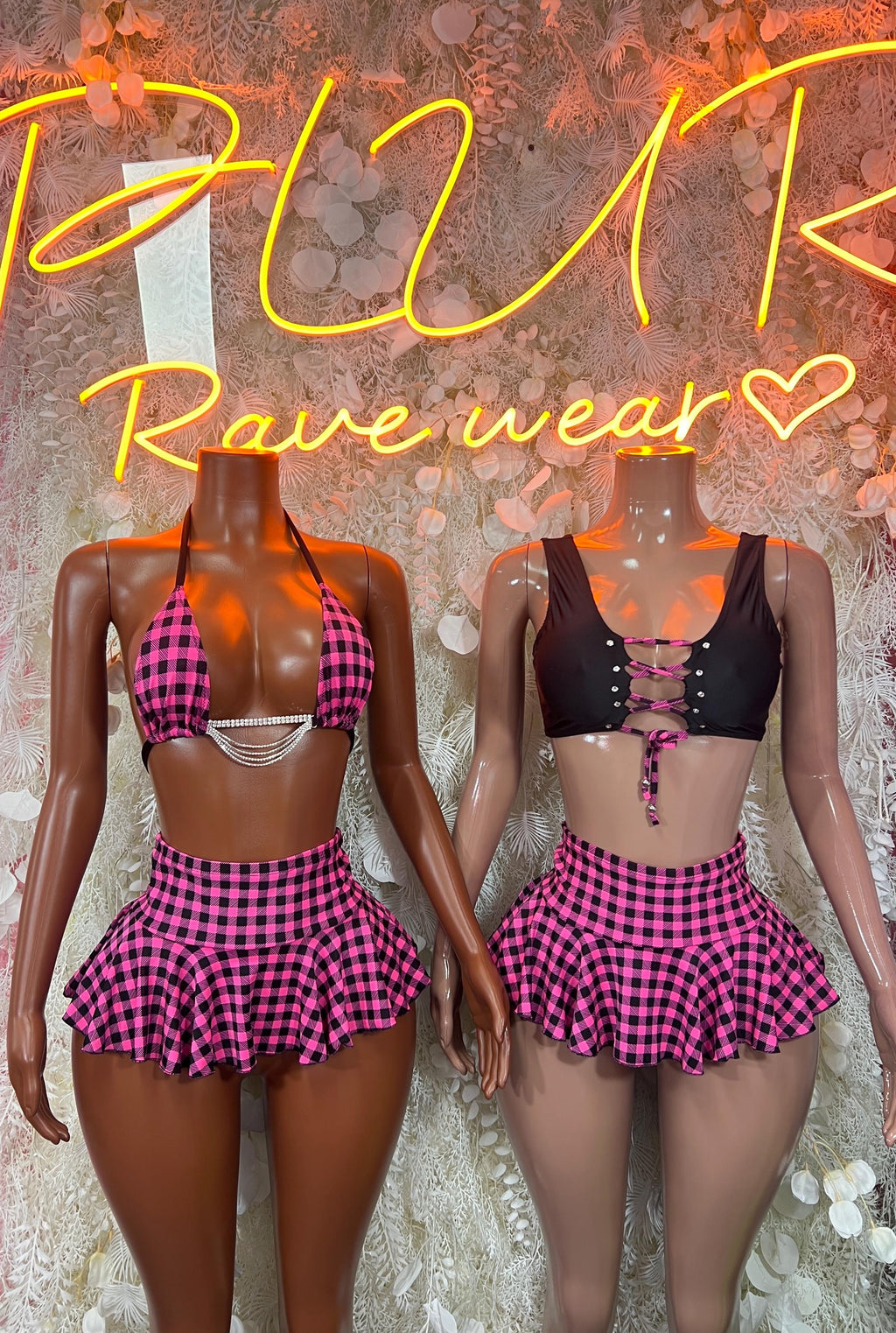 Two-piece rave set: black lace-up bra with pink plaid halter mini skirt