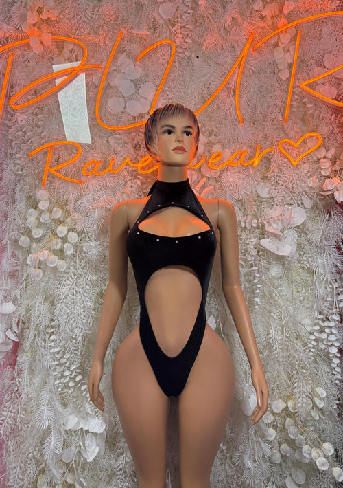 Black velvet one-piece bodysuit with halter neck and front cutout