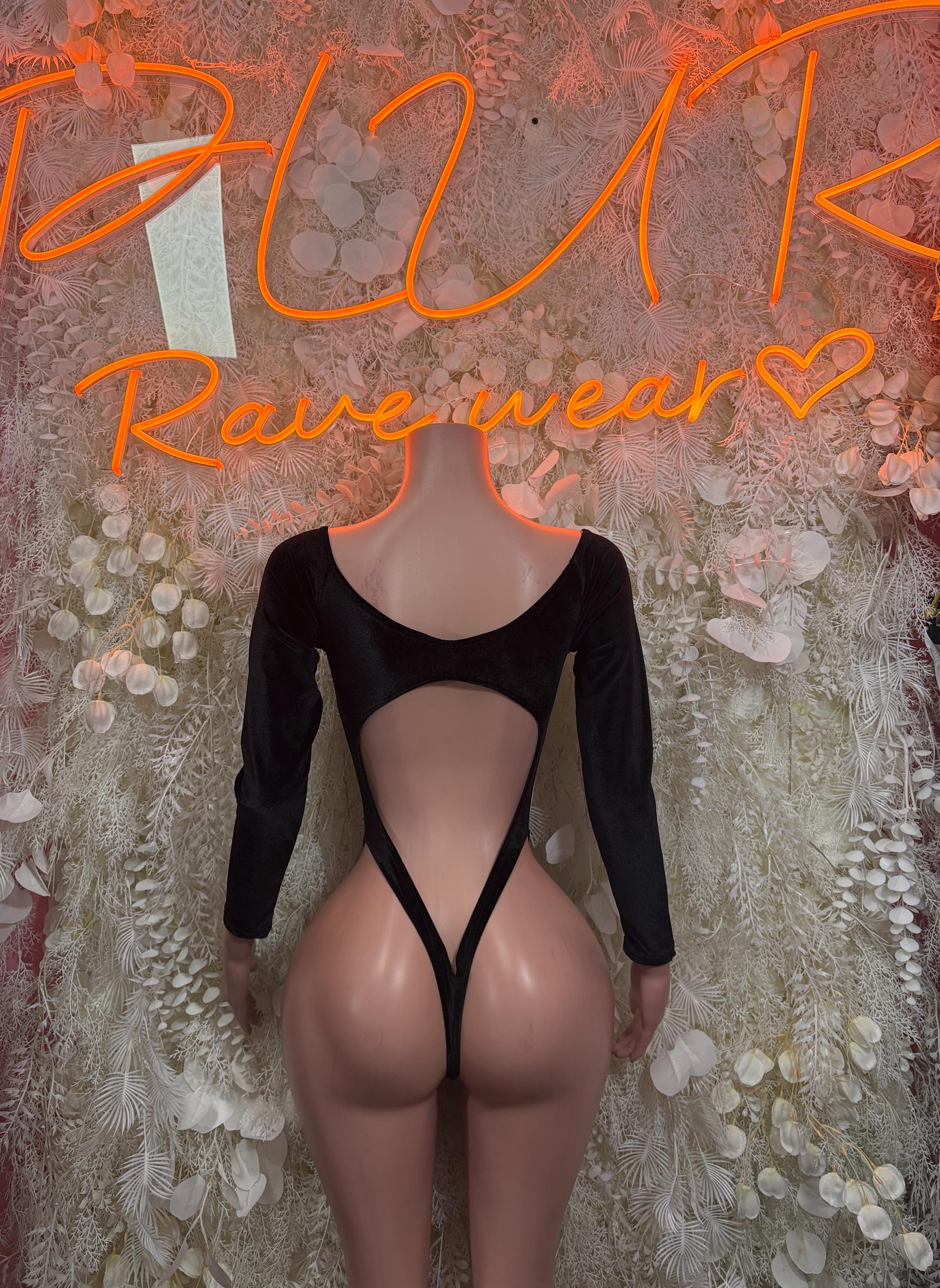 Black velvet bodysuit with long sleeves and open back with V strap