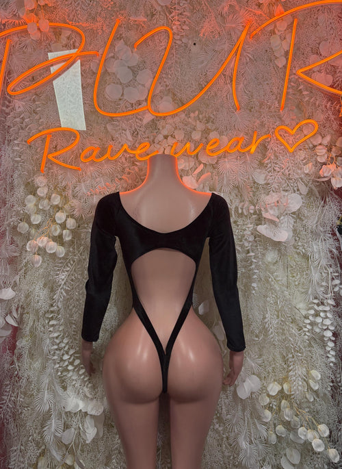 Black velvet bodysuit with long sleeves and open back with V strap