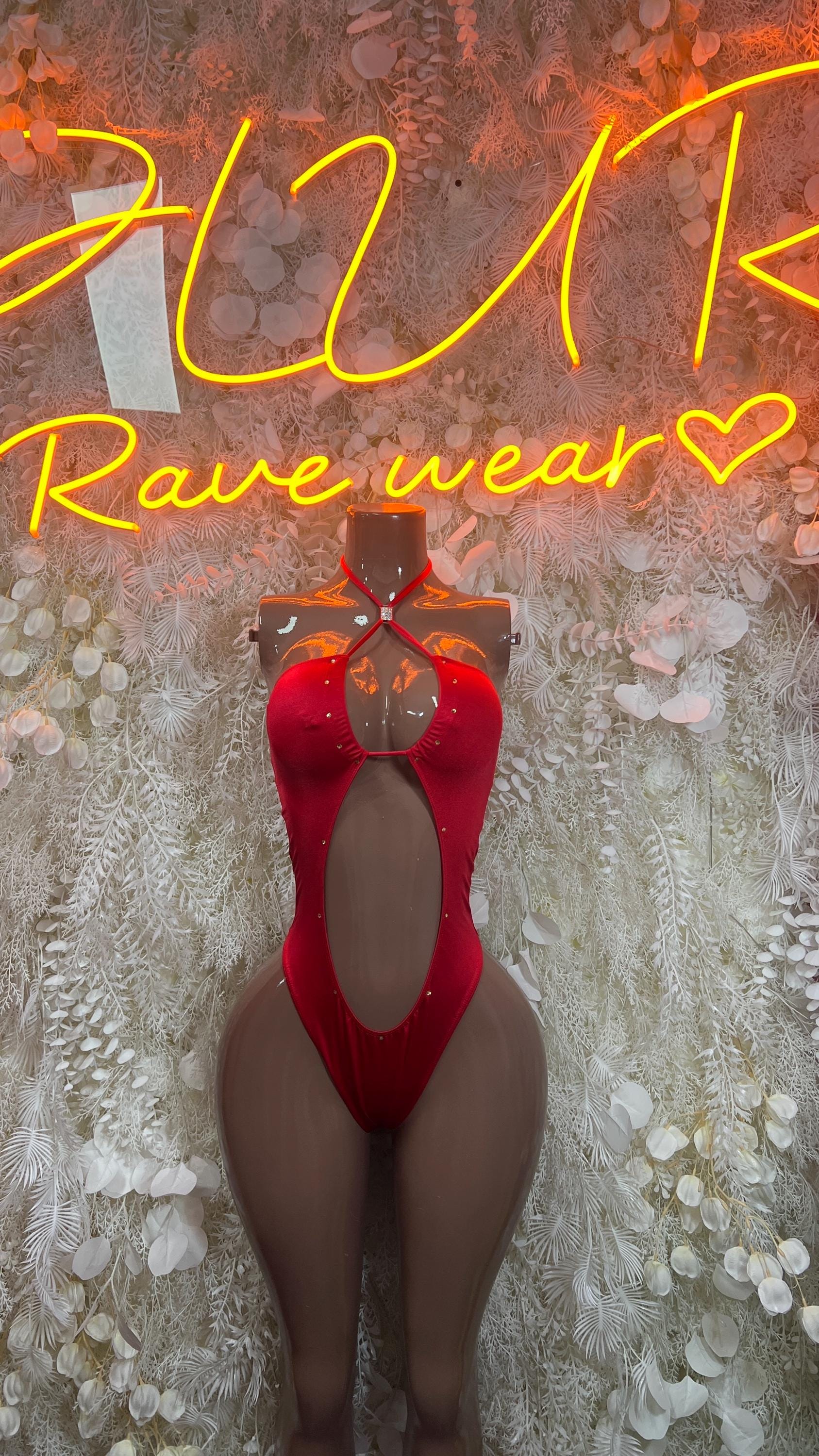 Red backless long-sleeve bodysuit with teardrop back cutout and high-cut back