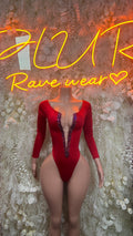 Red long-sleeve lace-trim bodysuit with deep V neckline and high-cut leg