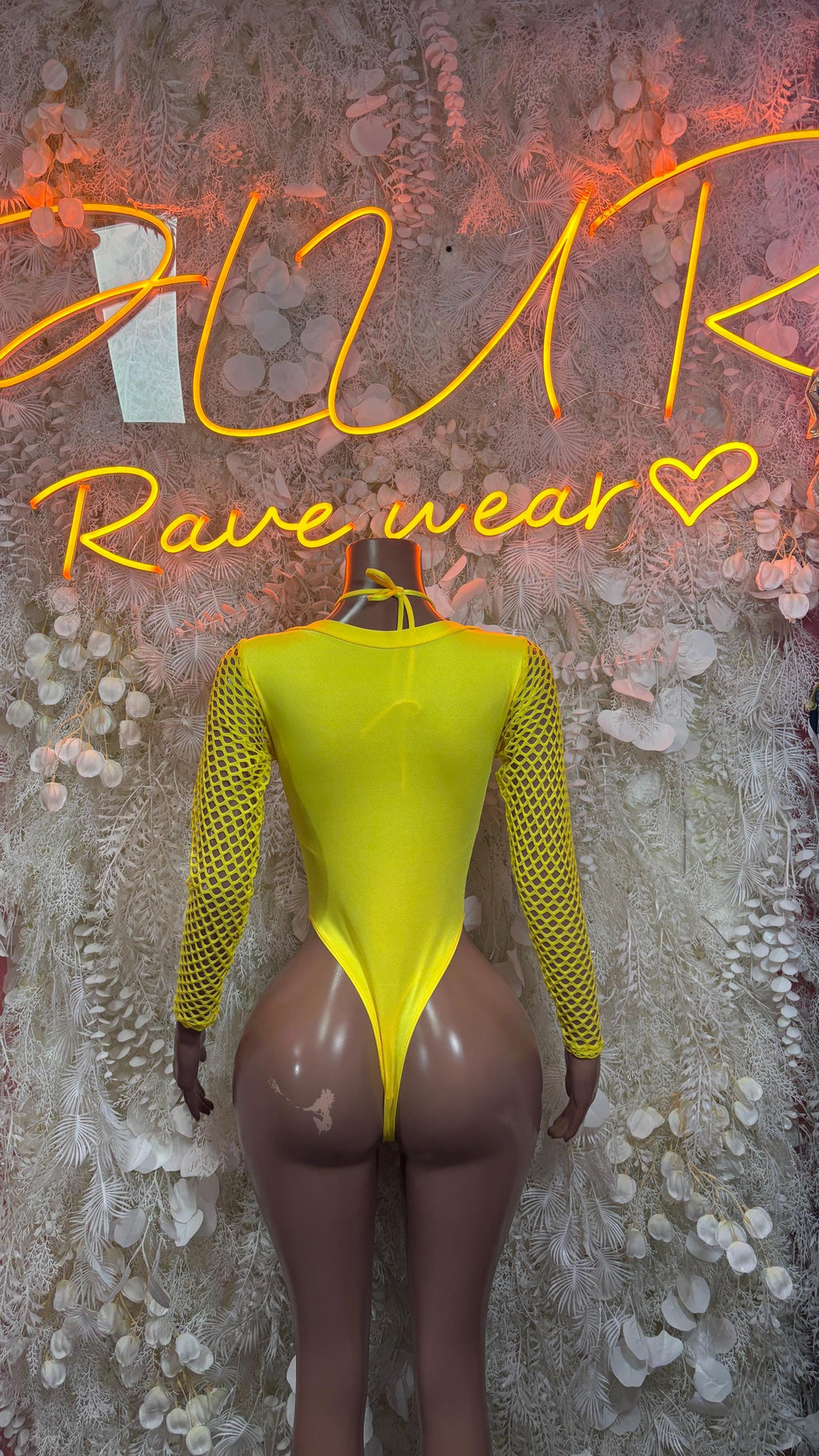 Yellow metallic bodysuit with front lace-up, plunging neckline, long mesh sleeves