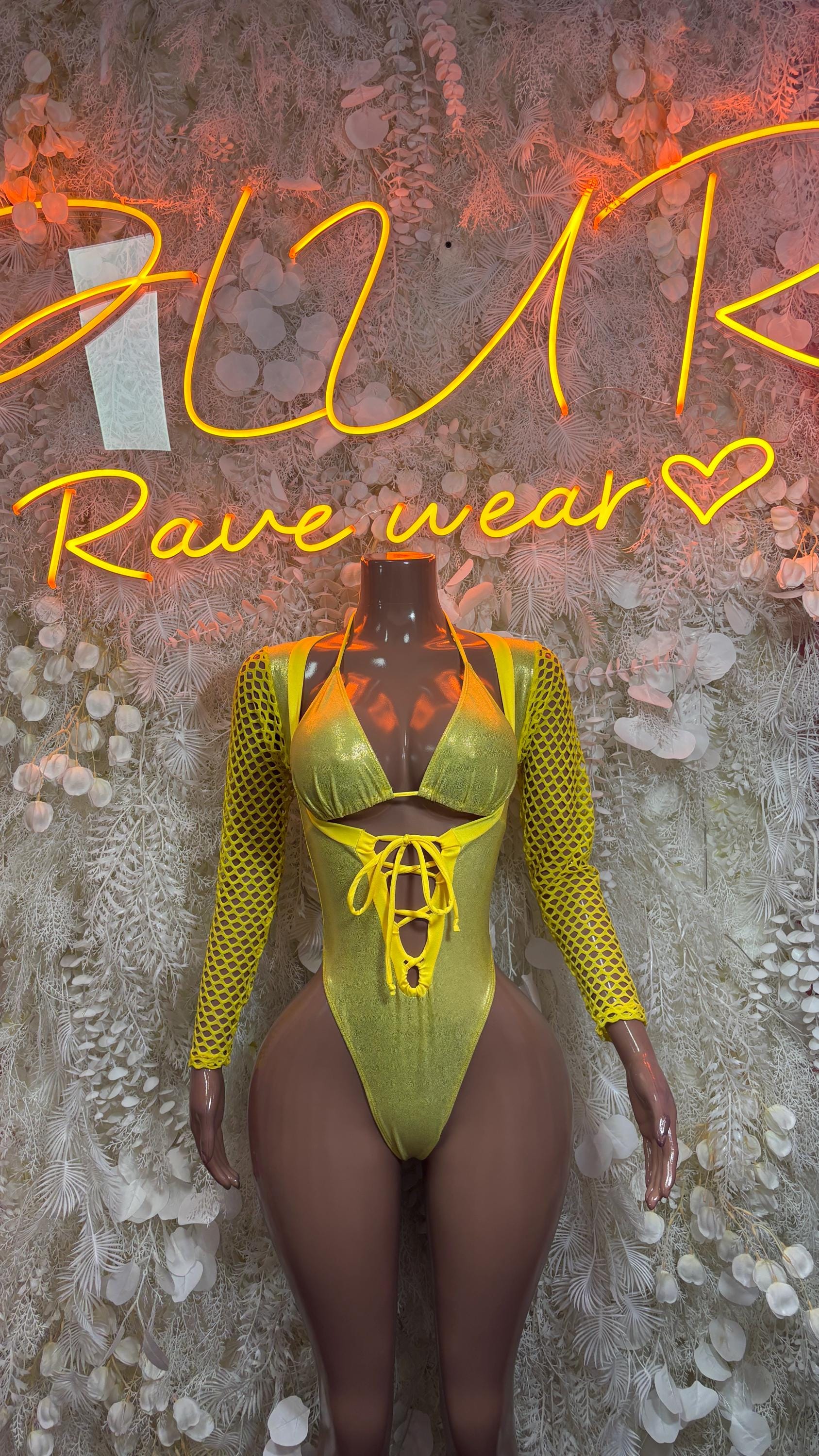 Yellow metallic bodysuit with crisscross lace-up chest and long mesh sleeves