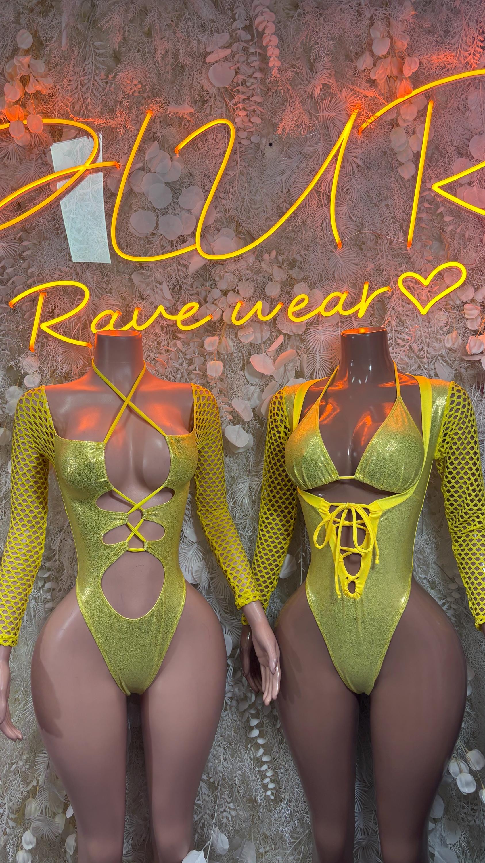Two yellow metallic bodysuits with lace-up cutout chest and long fishnet sleeves