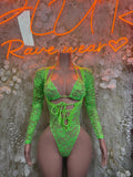 Neon green lace bodysuit with long sleeves, lace-up front and thong back