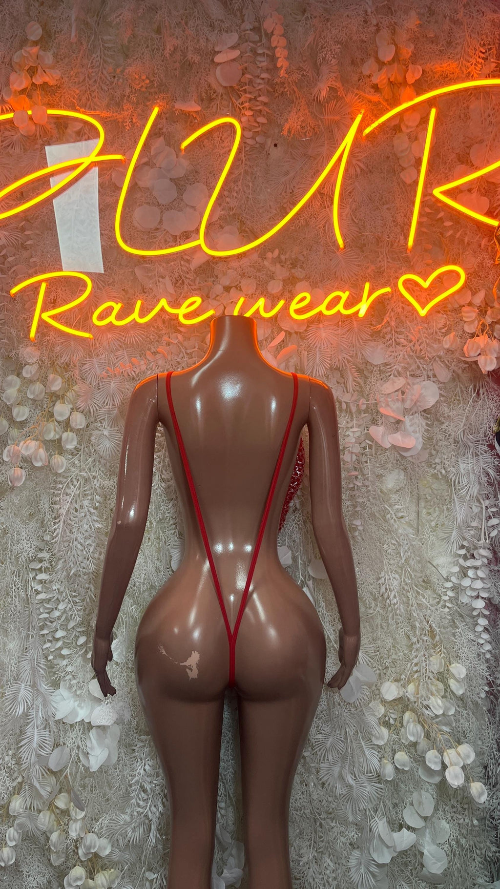 Red mesh bodysuit with deep V back and thin strap cutouts