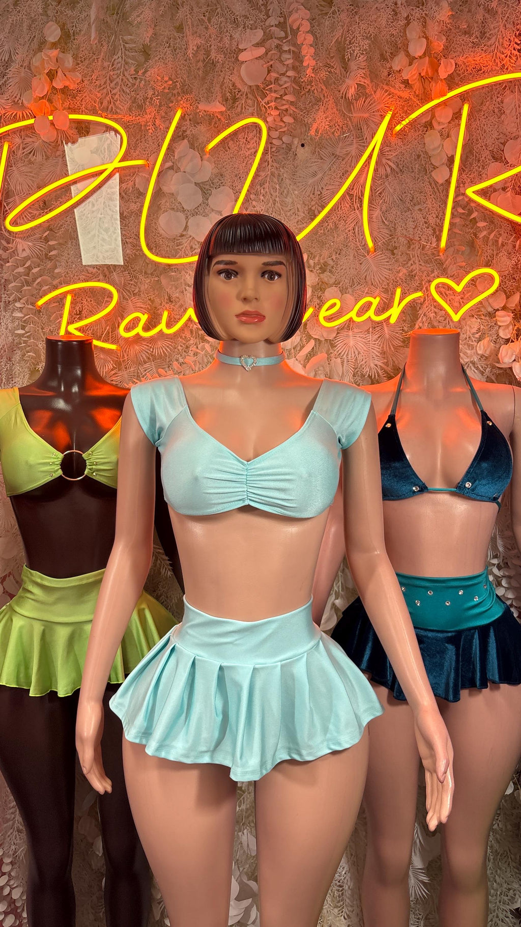Light blue velvet two-piece skirt set with choker, V-neck bra top and pleated mini skirt