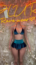 Teal velvet two-piece skirt set with bra top and pleated mini skirt, front view