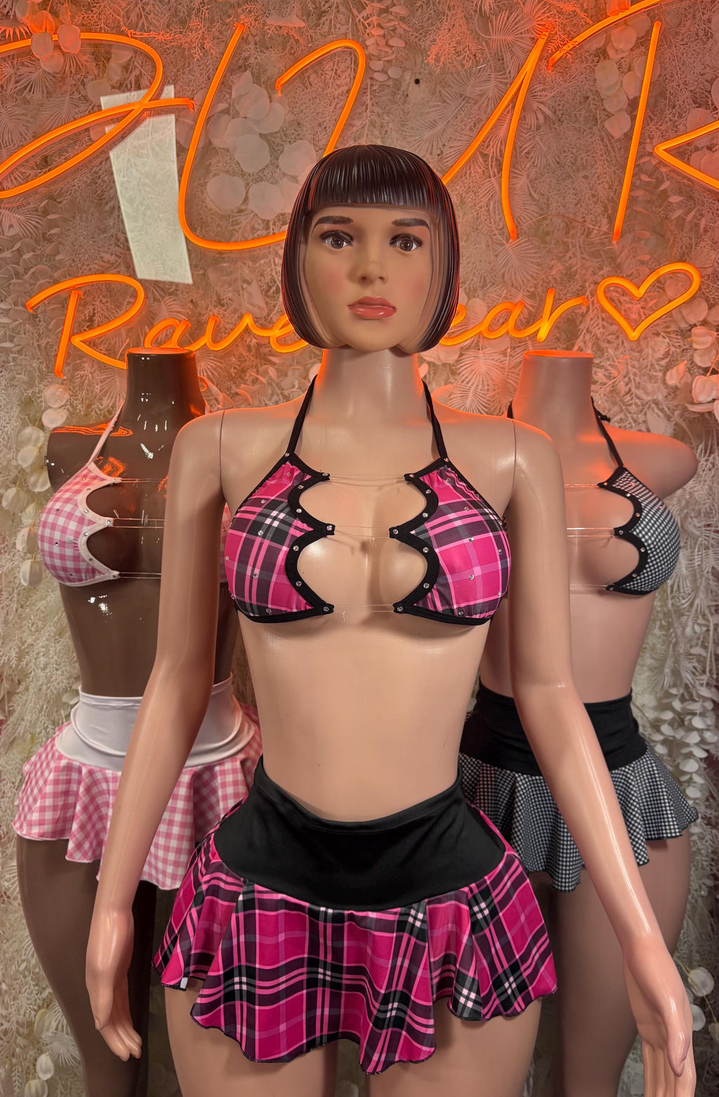 Rave outfit two-piece skirt set: pink plaid bikini top with black scallop trim and mini skirt