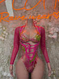 Pink and green patterned metallic-look bodysuit with long sleeves and front lace-up