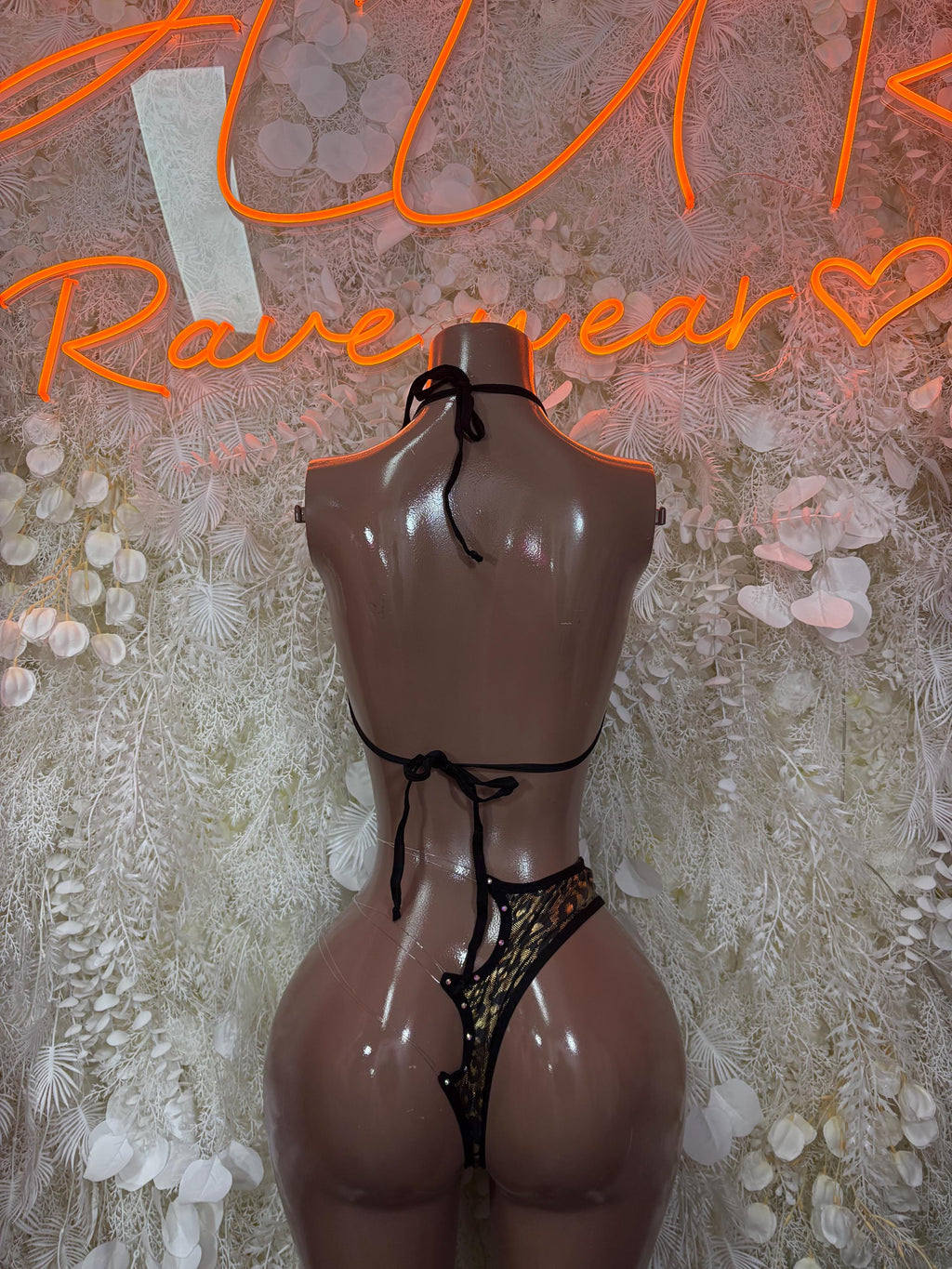Cheetah print two-piece dancewear with tie-back bra straps and high-cut matching bottom
