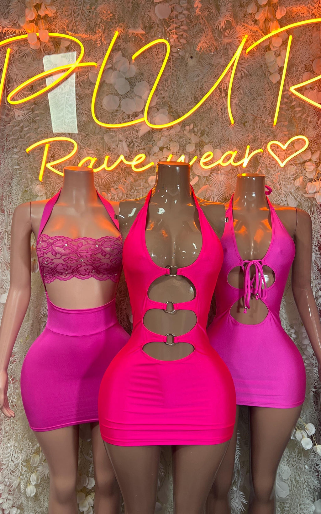 Set of three pink metallic mini dresses with halter necklines and ring hardware