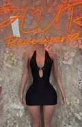 Black dancewear mini dress with teardrop chest cutout and halter strap detail