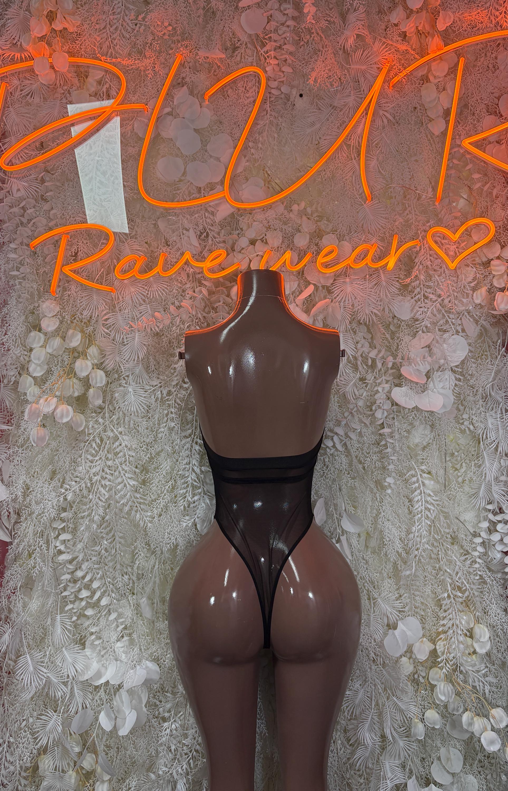 Black bodysuit with sheer mesh panels and open-back high-leg cut